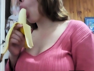 Big-Titted Latina Teen Sucks on Banana Like a Pro