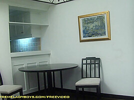 Tattooed ladyboy in black skirt getting fucked on the kitchen table